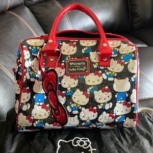 Hello Kitty Purse with dust bag.